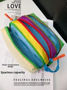 Internal view of colorful multi-compartment shoulder bag with three layered storage sections