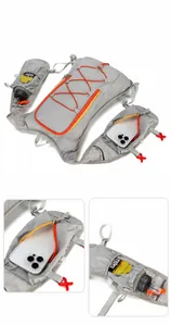Detail view of the lightweight hydration vest showing zipper pockets and mesh storage slots