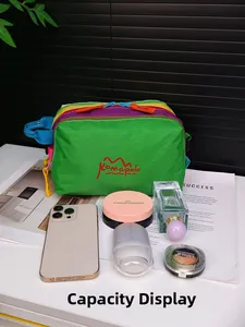 Detailed capacity view of a colorful patchwork crossbody bag with various cosmetics