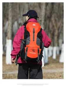 Close-up of 60L orange hiking backpack showing the water-resistant ripstop nylon fabric