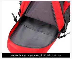 Detail view of the red backpack showing a dedicated 15.6 inch laptop compartment inside