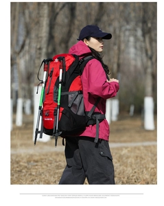 Outdoor 60L hiking backpack detail showing the trekking pole attachment system