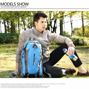 Detailed view of durable blue and grey nylon hiking backpack with side pockets and straps