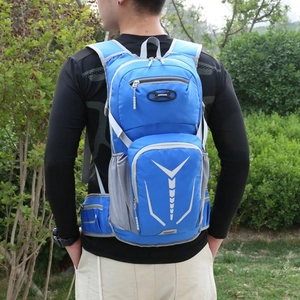 Blue cycling backpack with hydration pack capacity and safety reflective strips for outdoors