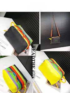 Detail of multi-pocket waterproof crossbody bag with color blocking and adjustable strap