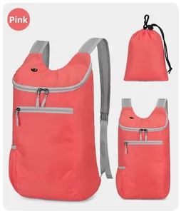 Pink foldable sports backpack with waterproof nylon fabric and compact storage bag