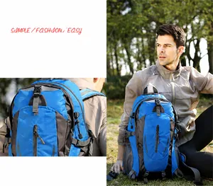 Detail of waterproof nylon hiking backpack in blue and grey with functional zipper pockets