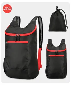 Detail of water-resistant foldable outdoor backpack in black and red with mesh straps