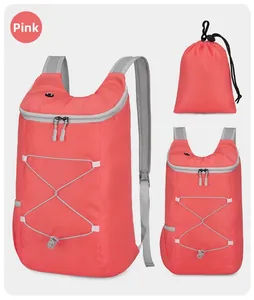 Pink water-resistant foldable sports backpack with mesh straps and elastic cords