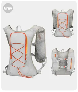 Detail view of grey lightweight hydration vest with orange trim and breathable mesh fabric