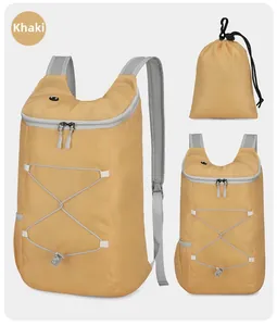 Macro view of khaki water-resistant foldable hiking backpack with breathable mesh straps