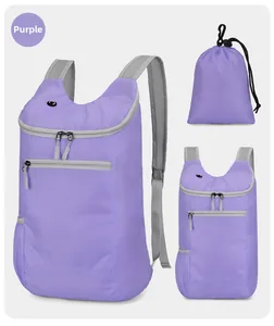 Purple waterproof folding backpack showing expanded view and compact storage pouch