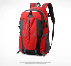 Side view of red and grey outdoor hiking backpack with waterproof fabric and straps
