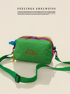 Detail of multi-color crossbody bag with Kamapelo logo and durable green nylon fabric