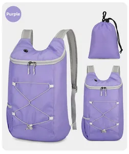 Macro view of purple waterproof hiking backpack showing foldable fabric and texture