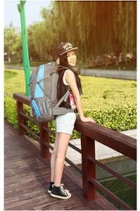 Outdoor ergonomic hiking backpack with padded shoulder straps and blue color block design