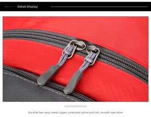 Detail of the durable two-way metal zippers and nylon pulls on this outdoor travel backpack