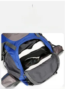 Hiking backpack featuring a separate bottom shoe compartment for organized sports storage
