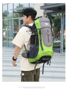 Detail view of green 65L hiking backpack with ergonomic straps and mesh side pockets