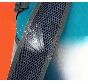 Detail of lake blue breathable honeycomb mesh shoulder straps on lightweight travel bag