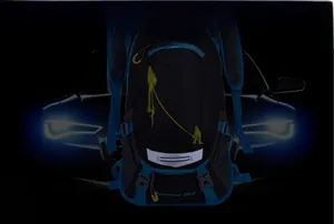 Detail of outdoor cycling backpack showing high-visibility safety reflective strip at night