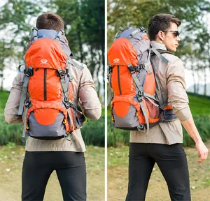 Detail of orange outdoor hiking backpack showing back padding and side storage pockets