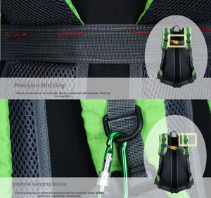 Detail of reinforced stitching, D-ring attachment and breathable mesh back on green hiking pack