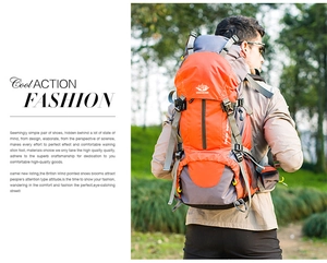 Detail of ergonomic trekking backpack with adjustable straps in orange and grey nylon
