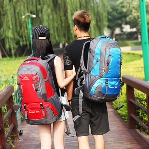 Outdoor 60L hiking backpack in red and blue colors for trekking and traveling