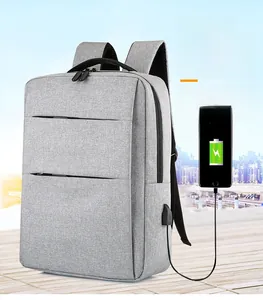 Gray laptop backpack detail showing the external USB charging port for mobile devices