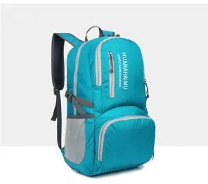 Side view of foldable waterproof outdoor backpack in light blue with grey breathable straps