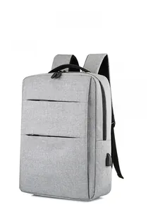 Side view of gray business laptop backpack with external USB port and padded straps