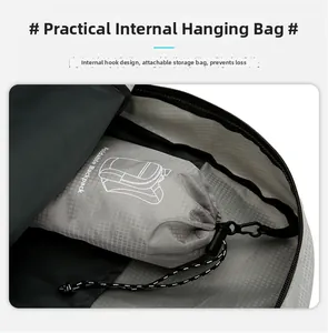 Close-up of gray backpack interior showing checkered lining and internal hanging bag