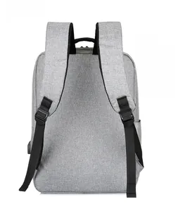 Detail of the gray laptop backpack back view with padded straps and USB charging port