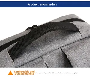 Detailed close-up of a reinforced black handle on a grey business laptop backpack