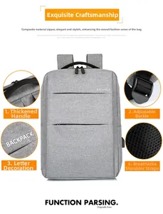 Detail view of grey business backpack with reinforced handle and breathable mesh straps