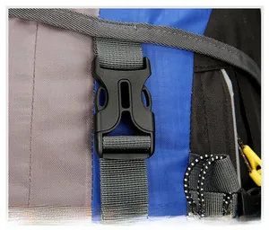 Detail of durable plastic buckle and reinforced strap on waterproof hiking backpack