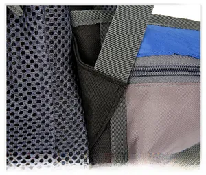 Close-up of reinforced stitching and breathable mesh on a waterproof hiking backpack