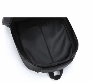 Internal detail of a black laptop backpack featuring organized multi-layer storage compartments