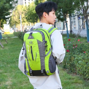 Waterproof outdoor hiking backpack in green and grey for camping and travel sports