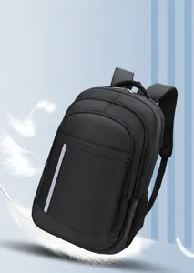 Detail view of lightweight black backpack featuring mesh side pockets and reflective safety strips