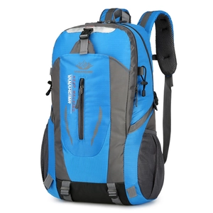 Waterproof outdoor backpack in blue and grey for hiking, camping, and leisure travel