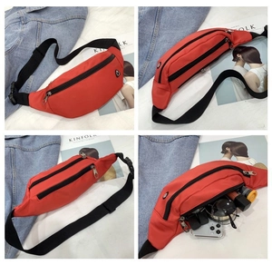 Detaillierte Ansichten der roten Nylontasche mit mehreren Fächern und Kopfhöreranschluss