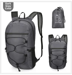 Foldable dark grey backpack showing ripstop texture and breathable mesh shoulder straps
