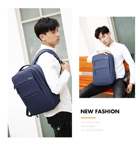 Detail of dark blue waterproof laptop backpack featuring a hidden zipper and breathable straps
