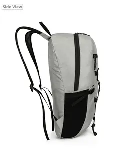 Side view of gray outdoor folding backpack showing tear-resistant fabric and mesh pockets