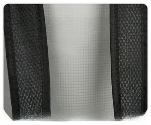 Detailed macro view of breathable honeycomb mesh shoulder straps with ergonomic padding