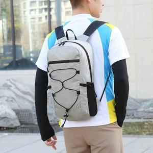 Waterproof foldable outdoor backpack in silver grey with elastic cord for hiking