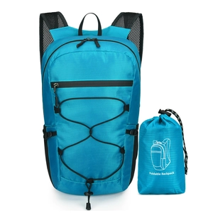 Sky blue foldable lightweight travel backpack with portable storage bag and mesh straps