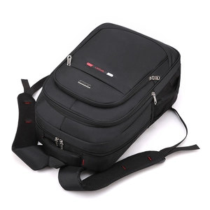 Mochila negra minimalista e impermeable de gran capacidad para hombre con varios bolsillos